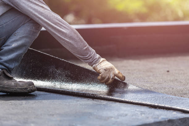 Professional Waterproofing technician working in Philo, OH